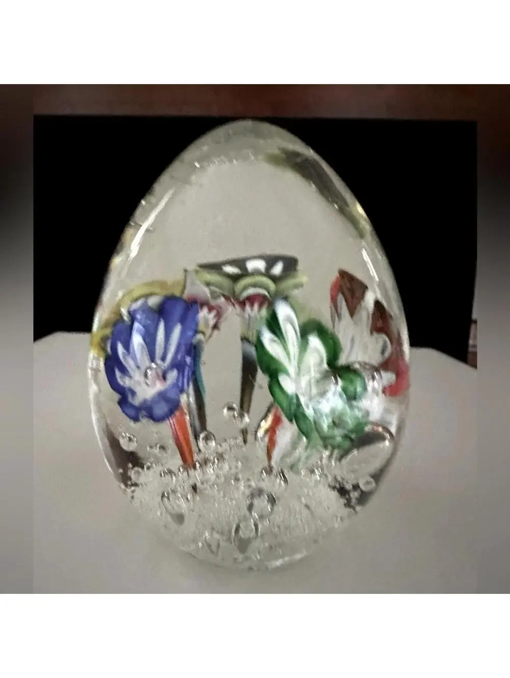 Vintage oval shaped solid blown glass sculpture with flowers and flat base